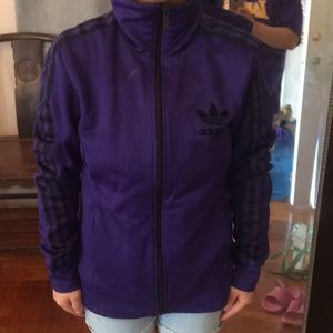 This is a Adidas,purple&black color m size jacket
